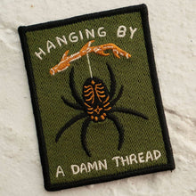  Écusson - Hanging by a Thread